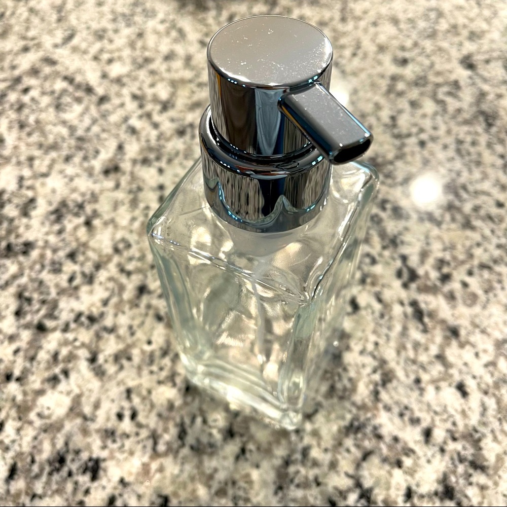 Clear foam soap dispenser with durable plastic pump head.